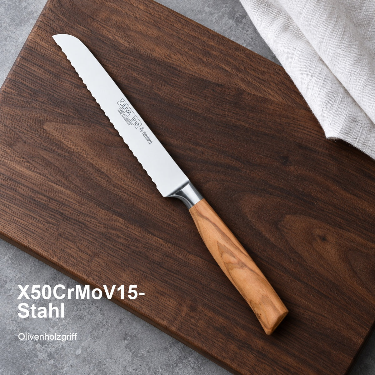 Brötchenmesser Oliva 13 cm – X50CrMoV15-Stahl; Olivenholzgriff. Vorhandenes Bild aus der Hero-Sektion mit Materialangabe.