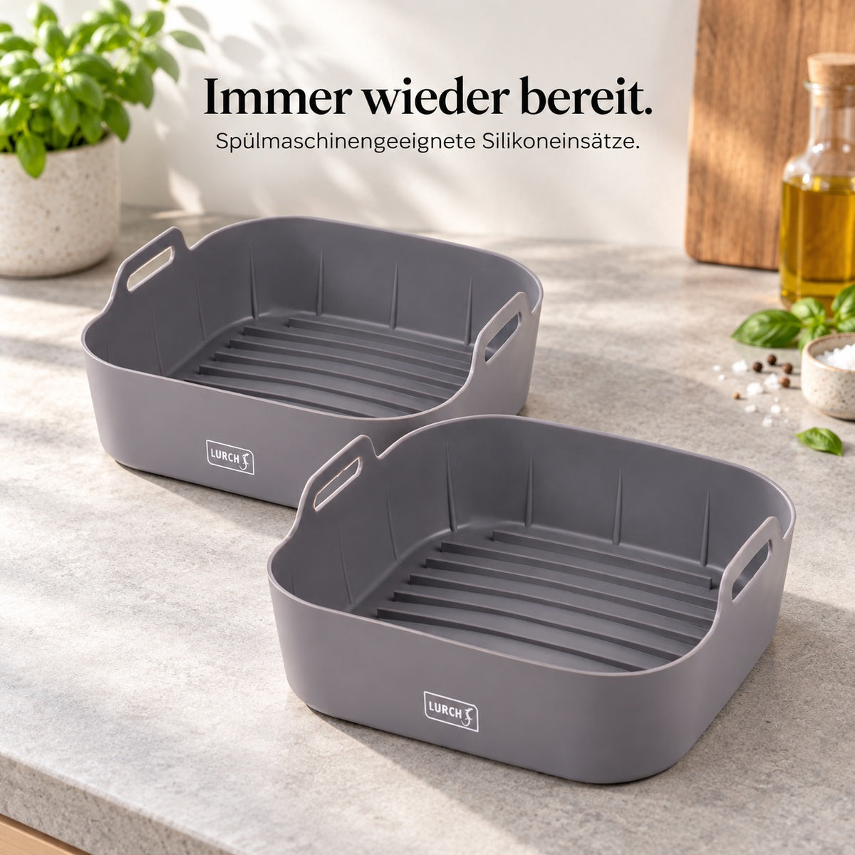 Lurch Airfryer-Einsätze S, zwei Silikonformen mit Grifföffnungen und gerilltem Boden – spülmaschinengeeignet.