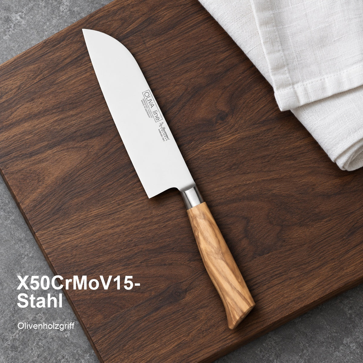 Santoku Oliva – X50CrMoV15-Stahl; Olivenholzgriff. Vorhandenes Bild aus der Hero-Sektion mit Materialangabe.