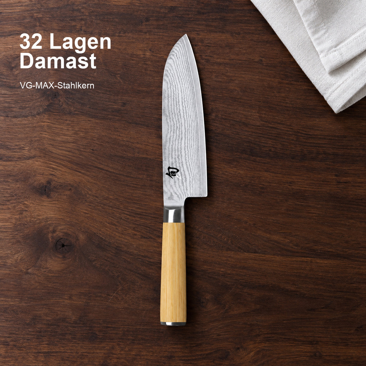 KAI Santoku Shun Classic White 18 cm – 32 Lagen Damast; VG-MAX-Stahlkern. Vorhandenes Hero-Bild mit Materialangabe.