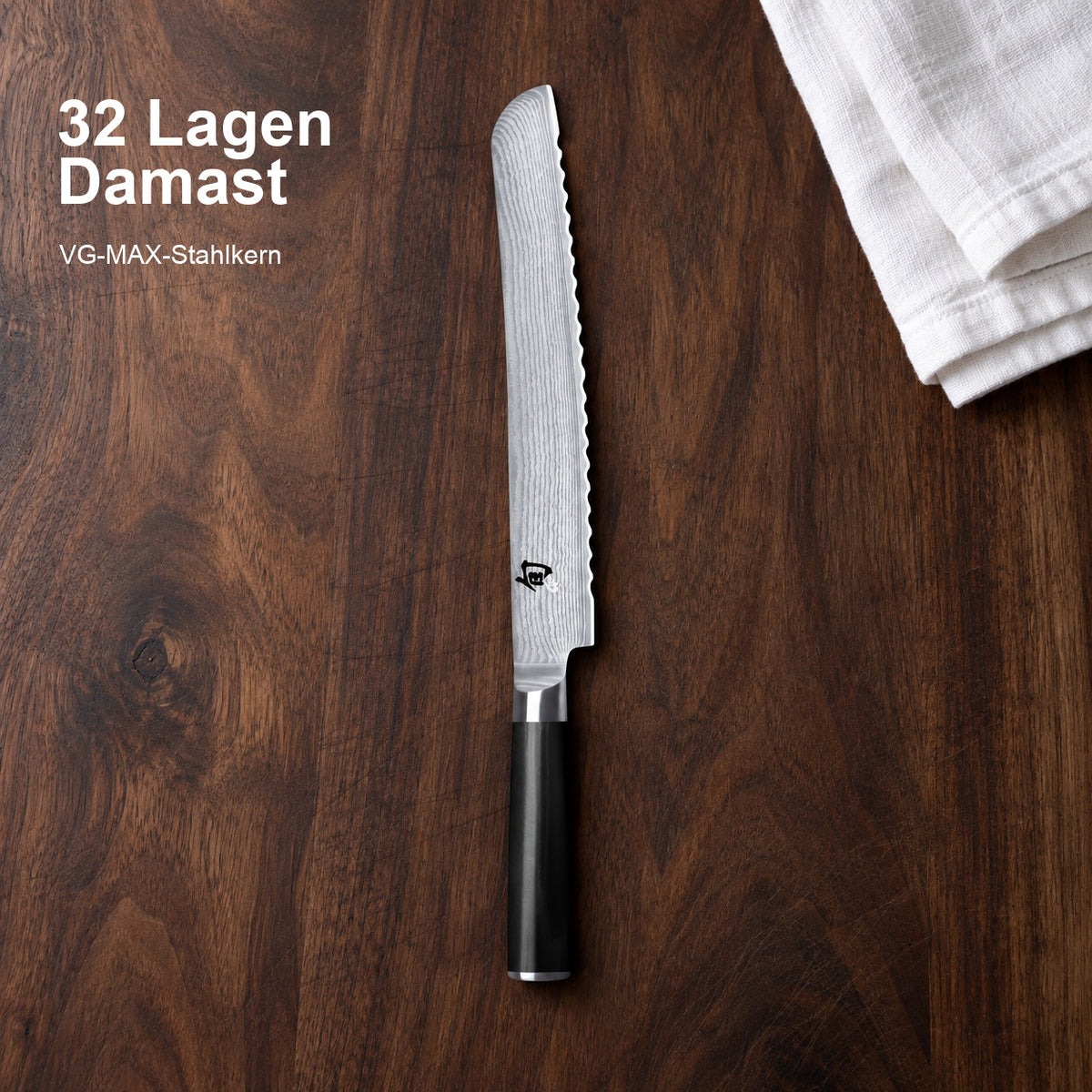 KAI Brotmesser Shun Classic 23 cm – 32 Lagen Damast; VG-MAX-Stahlkern. Vorhandenes Hero-Bild mit Materialangabe.