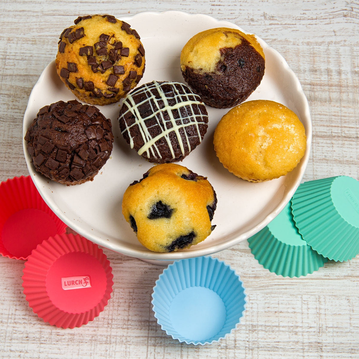 Muffinförmchen FlexiForm, 12er-Set – Hersteller-Originalbild. Anwendungs- und Serienmotive können Lebensmittel, Dekoration oder separat erhältliches Zubehör zeigen; maßgeblich ist der beschriebene Lieferumfang.